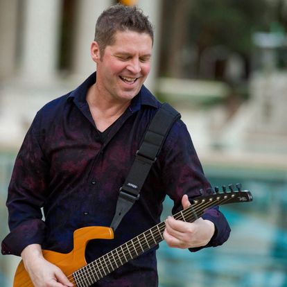Chad playing guitar